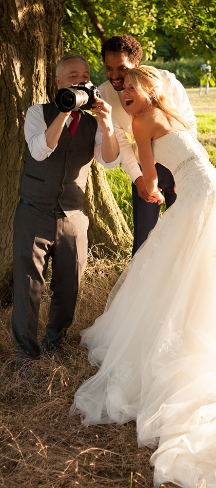 Don sharing his picture with the bride and groom